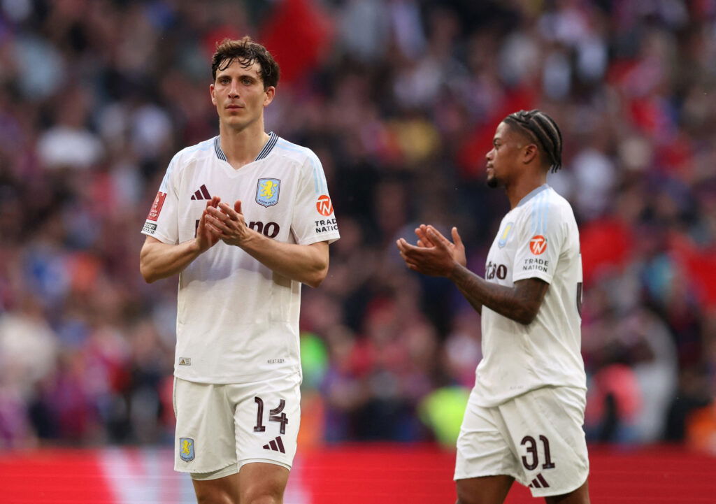 Aston Villa players Pau Torres and Leon Bailey applaud the fans